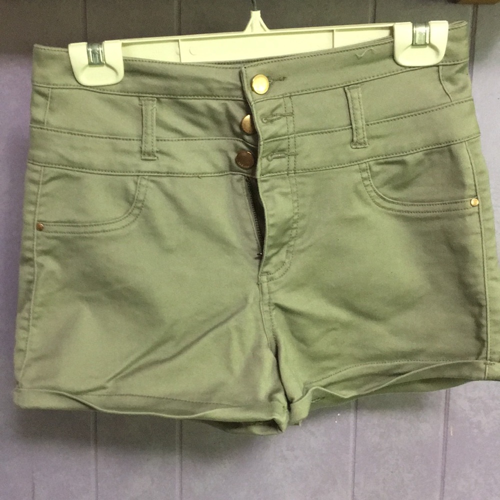 Khaki colored high waisted shorts